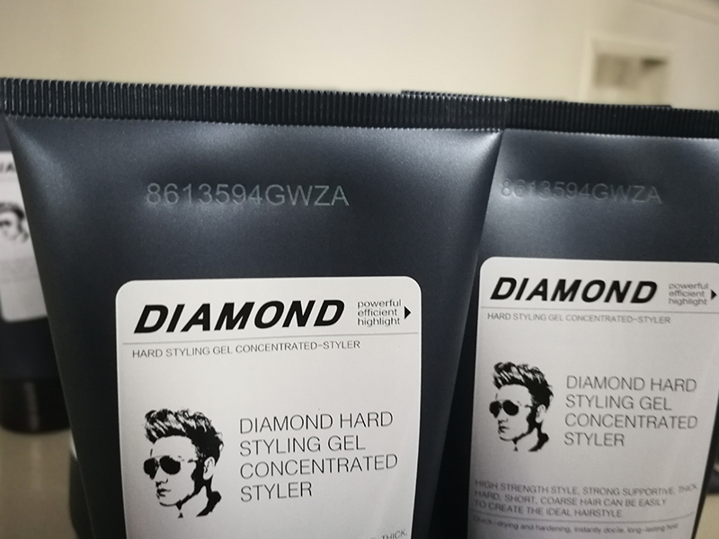 Fiber laser marking on a plastic facial cleanser bottle Fiber laser marking on a plastic facial cleanser bottle