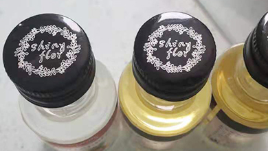 glass bottle metal caps laser logo marking glass bottle metal caps laser logo marking